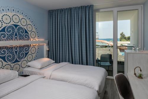 Quarto duplo, superior, lado do mar