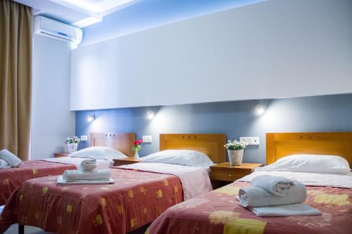 Hotel Rodon Hotel Rodon is conveniently located in the popular Paralia Katerinis area. The property features a wide range of facilities to make your stay a pleasant experience. Free Wi-Fi in all rooms, daily hous