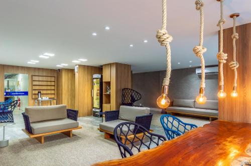 gedeelde lounge/tv-ruimte, Hotel Costamar Ponta Verde in Maceió