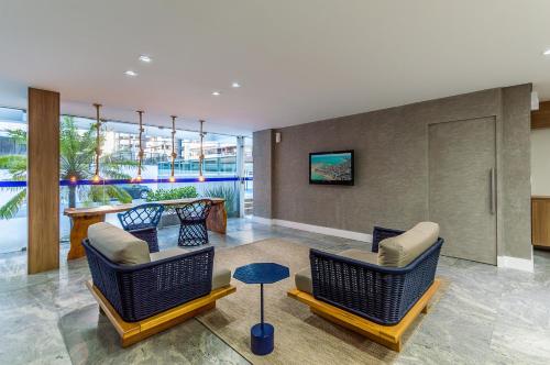 gedeelde lounge/tv-ruimte, Hotel Costamar Ponta Verde in Maceió