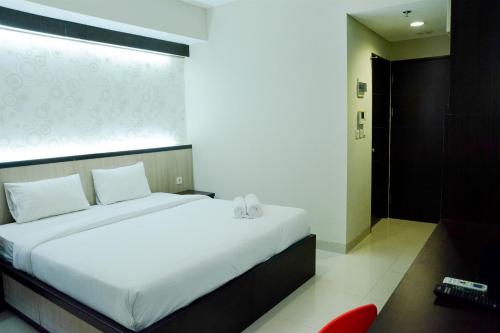 Brand New Studio Room Atria Residence Apartment By Travelio