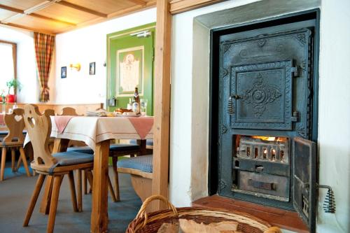 ห้องอาหาร, Gastehaus Enzianhof Hotel Garni in โอเบอราเมอเกา