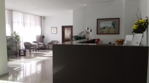Фойє, Hotel Melius in Бежа