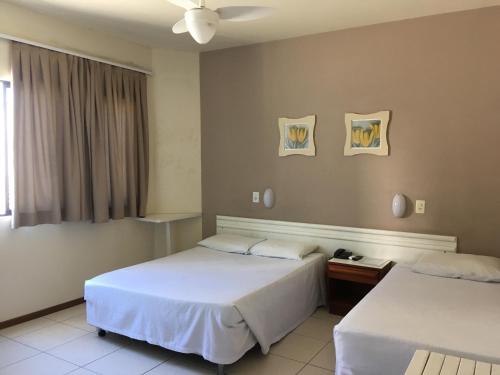 Featured image of post Hotel Cambirela Palho a Rooms at cambirela hotel have white interiors with tiled floors and en suite bathrooms