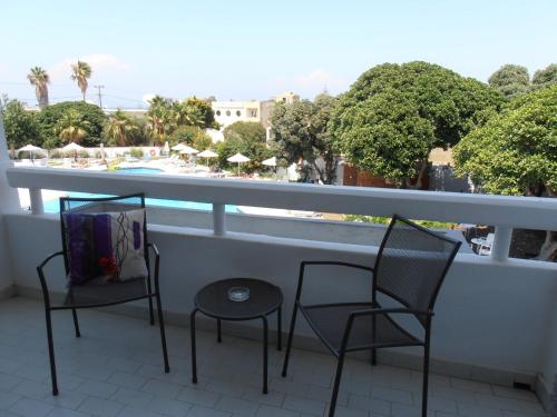 Happy Days Hotel Happy Days Hotel is perfectly located for both business and leisure guests in Rhodes. The property features a wide range of facilities to make your stay a pleasant experience. Take advantage of the ho