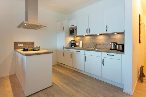 Kitchen, Komfort-Ferienwohnung Wellenbrecher by Meer-Ferienwohnungen in Olpenitz