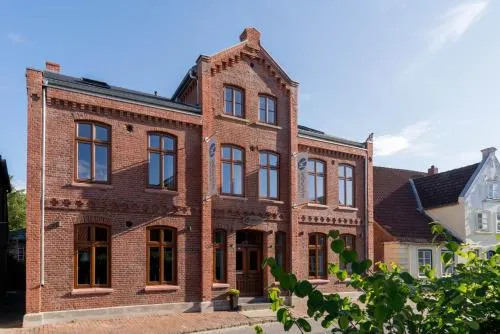 Wellenreiter in Tating, Deutschland