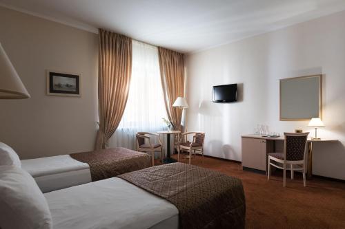 ONOVO Dendra Hotel Ideally located in the Darnyckyj area, ONOVO Dendra Hotel promises a relaxing and wonderful visit. The property offers a wide range of amenities and perks to ensure you have a great time. All the nece