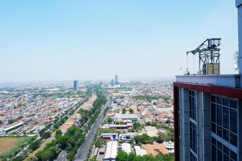 A Hotelcom Comfy Studio Tamansari Papilio Apartment By