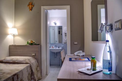 Hotel Domus Pacis Hotel Domus Pacis is conveniently located in the popular Santa Maria Degli Angeli area. The property features a wide range of facilities to make your stay a pleasant experience. 24-hour front desk, fa