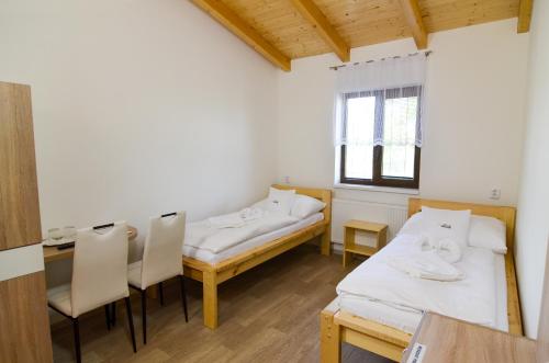 Rodinný wellness hotel U Langrů Room Type - Twin Room