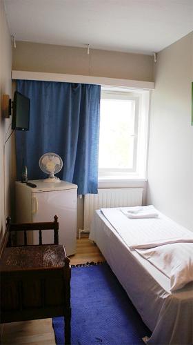 Standard Single Room with Shared Bathroom