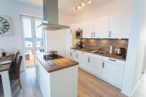 Kitchen, Komfort-Ferienwohnung Dat Penthuus by Meer-Ferienwohnungen in Olpenitz