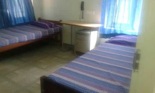 A Hotel Com Single Room Non Ac Accommodation In A Home