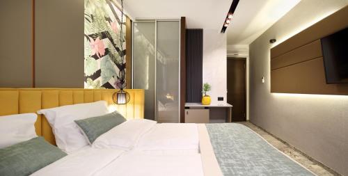 Hotel PLATINUM Set in a prime location of Sarajevo, Boutique Hotel PLATINUM puts everything the city has to offer just outside your doorstep. The property features a wide range of facilities to make your stay a plea