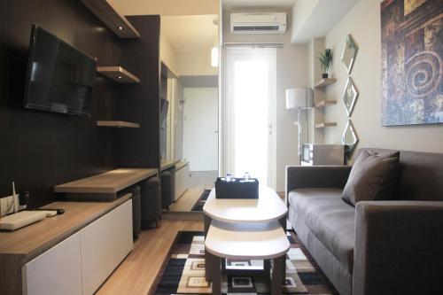 Deluxe and Comfortable 2BR The Springlake Summarecon Apartment By Travelio