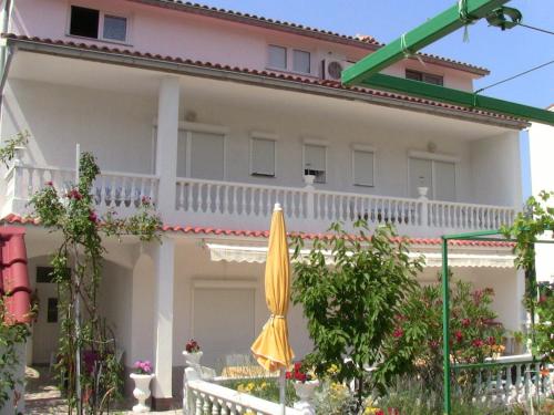 lovely apartments near the town of Rab with Children's pool, playground, garden, parking lot, grill, terraces,