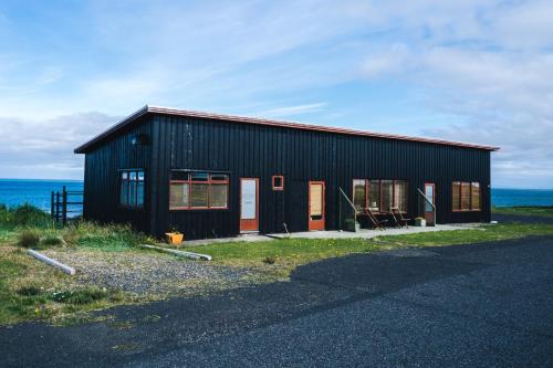 Entrance, Brenna - Ocean View Apartment in Hellissandur