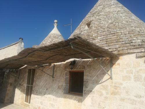  Terra Bruna - Trulli e Lamia, Pension in Cisternino