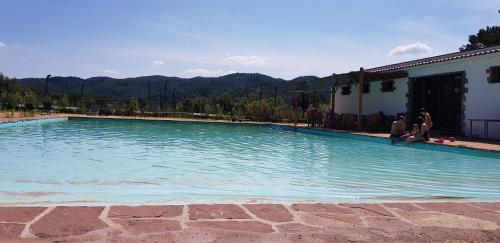 Úszómedence, Hostal La Guineu in Masvidal