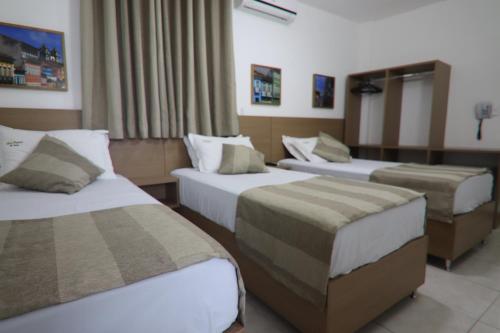Standard Triple Room room in Hotel Dom Passos