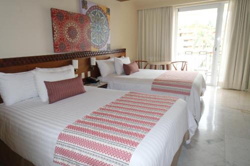 Deluxe Partial Ocean View Double room in Sunscape Puerto Vallarta Resort- All Inclusive
