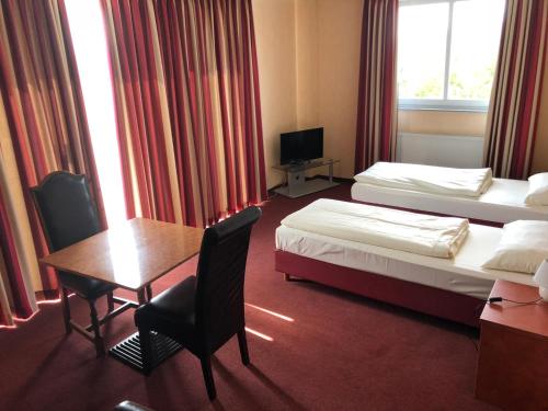 什列斯威豪斯汀酒店 (Schleswig Holstein Hotel) in 埃爾姆斯霍恩
