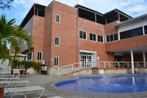 Swimming pool, Hotel Villa Playa Grande in Maiquetía