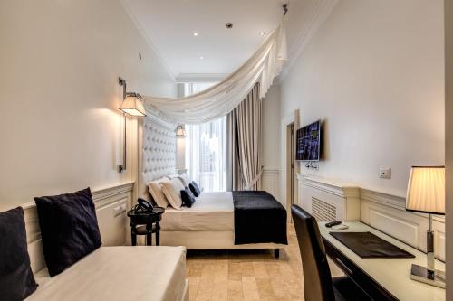Hotel dei Quiriti Suite Room Type - Triple Room
