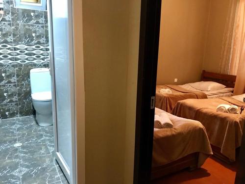 Guesthouse Chela Room Type - Quadruple Room with Private External Bathroom Guesthouse Chela Room Type - Quadruple Room with Private External Bathroom