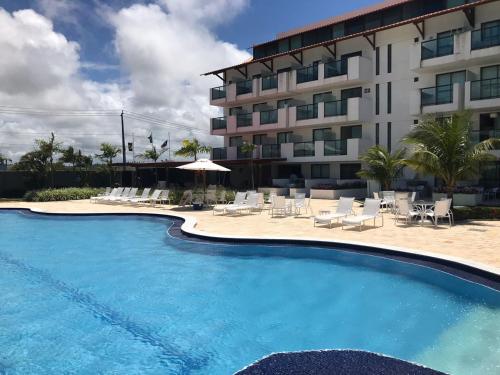 Kolam renang, Laguna Beach Flat in Porto De Galinhas
