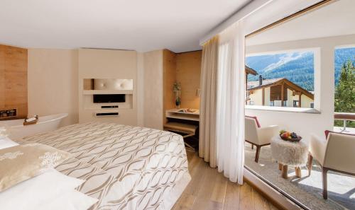 Giardino Mountain Located in Champfer, Giardino Mountain is a perfect starting point from which to explore Saint Moritz. The property offers a wide range of amenities and perks to ensure you have a great time. Service-