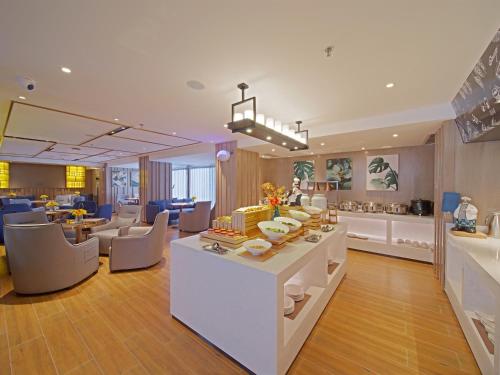 Photos of Echarm Hotel Guangzhou University Town Chimelong Banqiao Metro Station · Stays