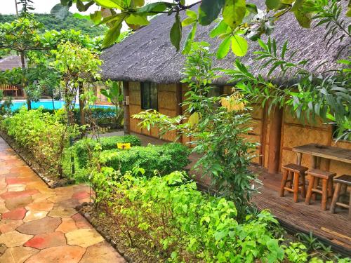 สวน, กาลาโย บีช รีสอร์ต (calayo beach resort) in นาซุกบู