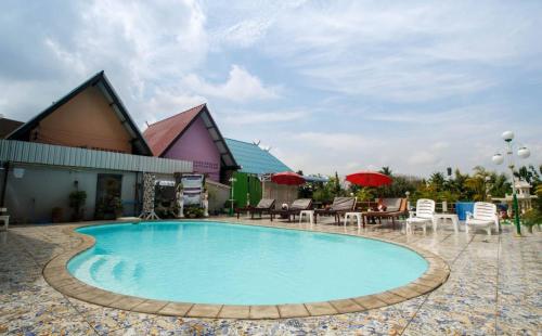 Swimming pool, Noble Night Guesthouse in Kanchanaburi