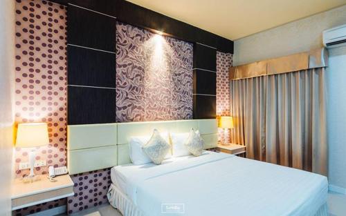 Guestroom, Martina Hotel (SHA Extra Plus) near Ramkhamhaeng University Surin Campus