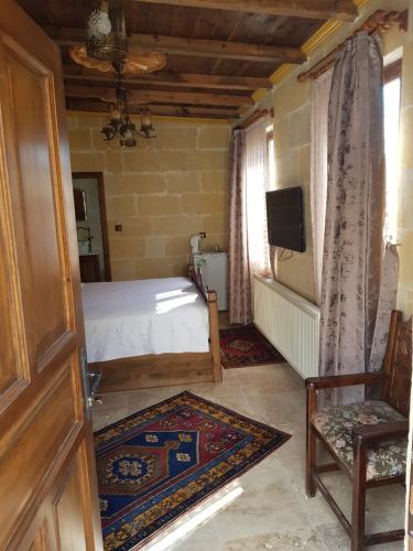 Vineyard Cave Hotel Room Type - Deluxe Stone Room