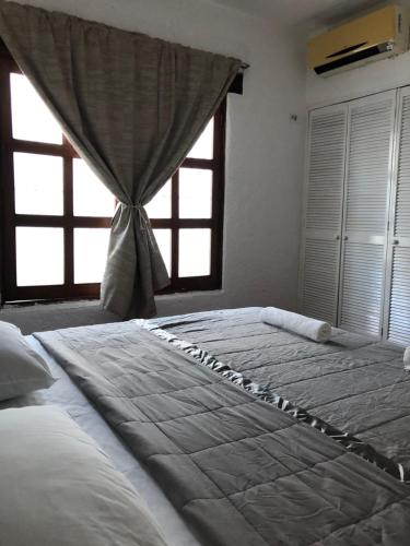 Grandiosa casa céntrica a minutos de la playa, Канкун (фото 9)