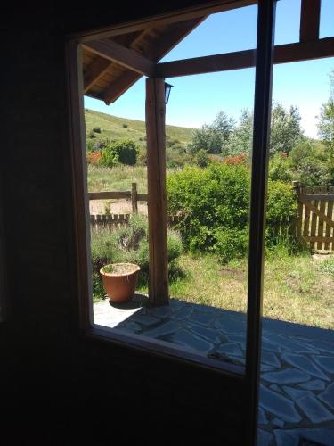 정원, Cabañas Boca del Chimehuín (Cabanas Boca del Chimehuin) in 후닌데 로스 안데스