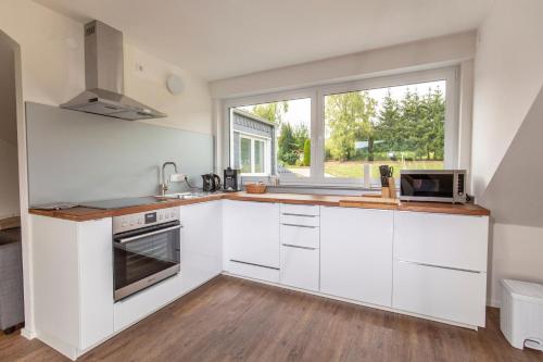 Ferienwohnungen "Am Mühlenberg" (Ferienwohnungen "Am Muhlenberg") in 林德拉爾