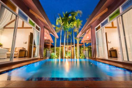 Swimming pool, IP Plus Pool Villa Pattaya in Thep Prasit