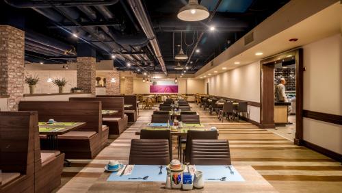 레스토랑, 클럽 호텔 에일랏 - 리조트, 컨벤션 앤 스파 (Club Hotel Eilat - Resort, Convention & Spa) in 엘리앗 시티 센터