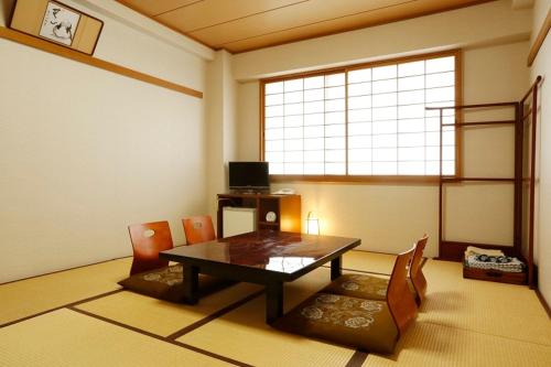 Hanazono Kaikan Stop at Hanazono Kaikan to discover the wonders of Kyoto. The property has everything you need for a comfortable stay. Daily housekeeping, wheelchair accessible, 24-hour front desk, facilities for dis