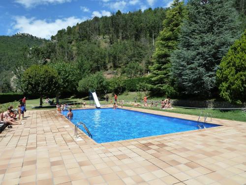 Úszómedence, Bungalows Pont d'Ardaix in Toloriu