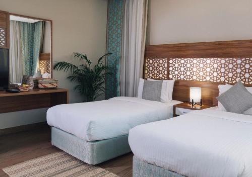 Bed, فندق جمانة ينبع in Yanbu
