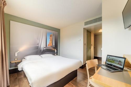 B&B Hotel BELFORT Set in a prime location of Danjoutin, B&B Hôtel BELFORT puts everything the city has to offer just outside your doorstep. The property offers a high standard of service and amenities to suit the indi