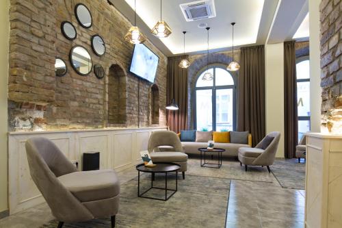 ห้องส่วนกลางสำหรับนั่งเล่น/ดูทีวี, มาร์ควิส โฮเทล การ์นี (Marquise Hotel Garni) in วราซาร์