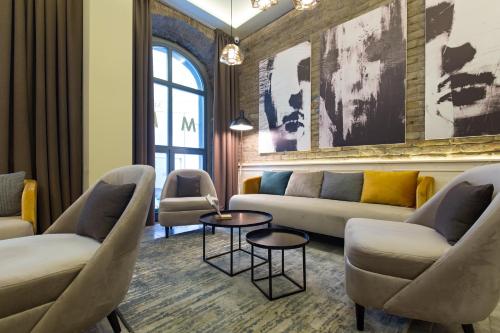 ห้องส่วนกลางสำหรับนั่งเล่น/ดูทีวี, มาร์ควิส โฮเทล การ์นี (Marquise Hotel Garni) in วราซาร์