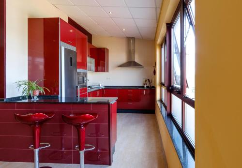 Kitchen, Albergue Via Lactea in Arzua
