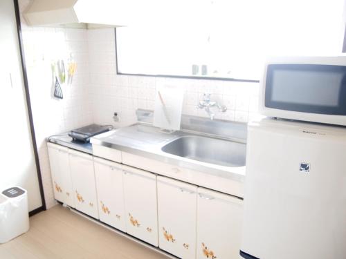 Kitchen, COCOSTAY Felice ココステイ フェリーチェ in Hiroshima